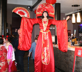 CHINESE NEW YEAR ENTERTAINMENT - CHINESE STILT WALKER ACTS HIRE